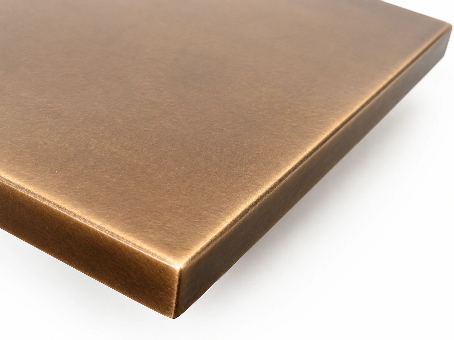 Close-up sample of finished brass material folded and welded