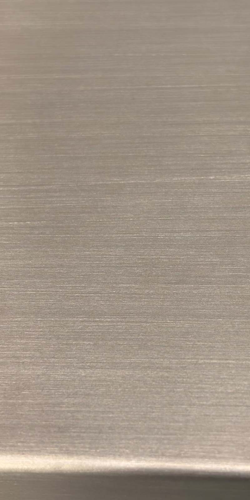 Brushed stainless steel panel for custom metal fabrication, South Florida