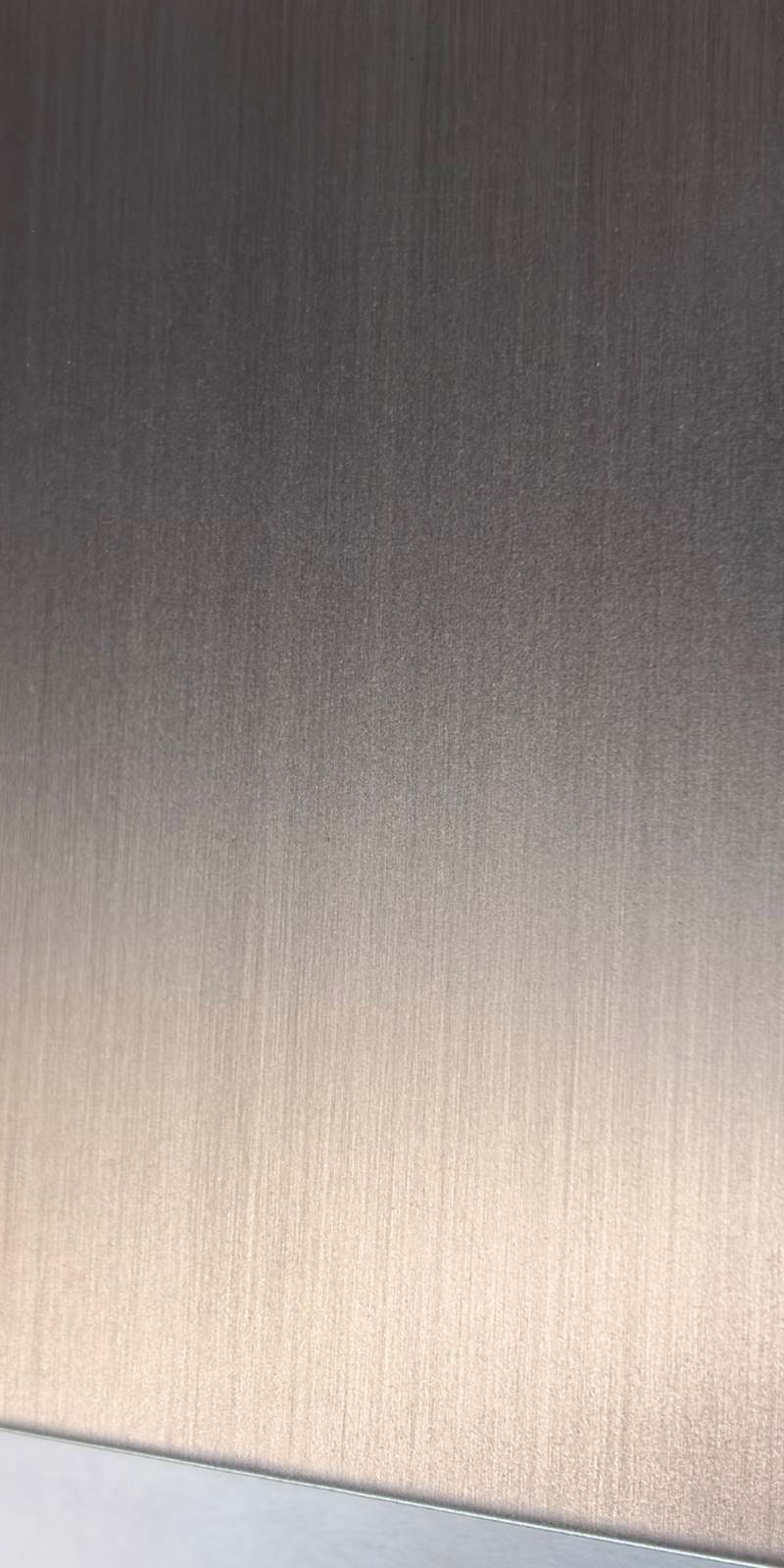 Stainless steel brushed patina panel for custom architectural metalwork